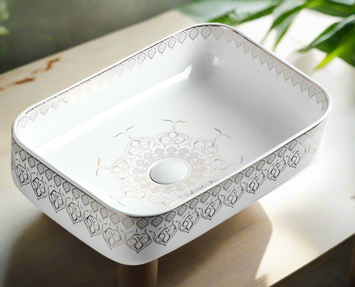 Rectangular ceramic sink with decorative patterns on a white background