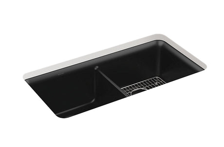 Black kitchen sink with silver rim on a white background