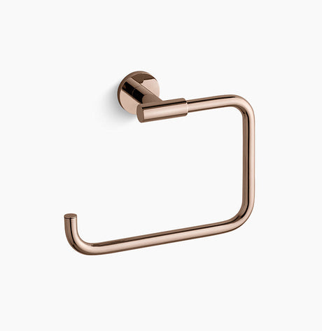 Rose gold toilet paper holder on a white background